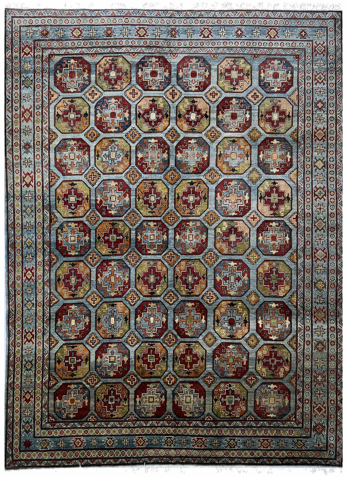 Afghan Kazak Rug 8x11 | light blue field with rows of red and gold octagon guls | gul design | hand-knotted wool